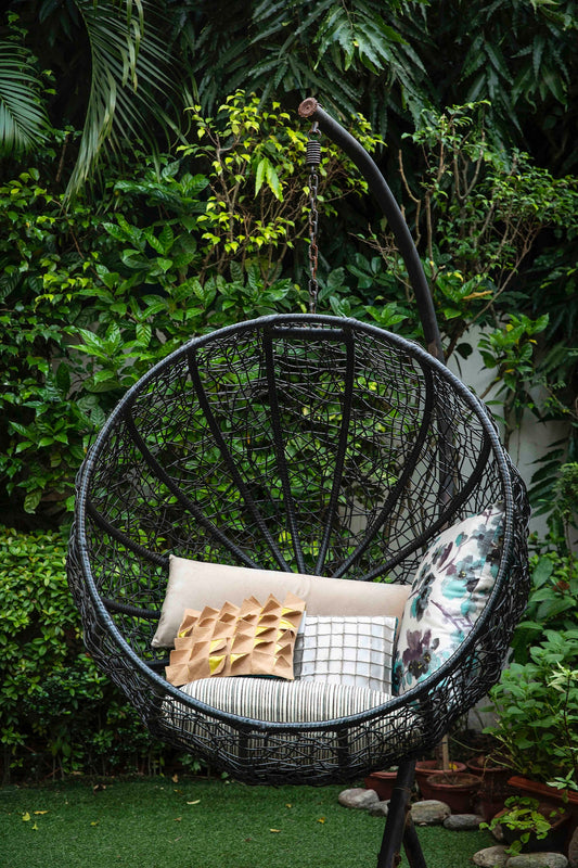 Can outdoor throw pillows be used indoors for added durability?