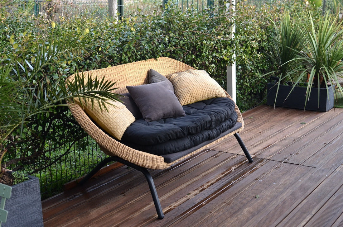 What are the advantages of using indoor throw pillows for outdoor spaces